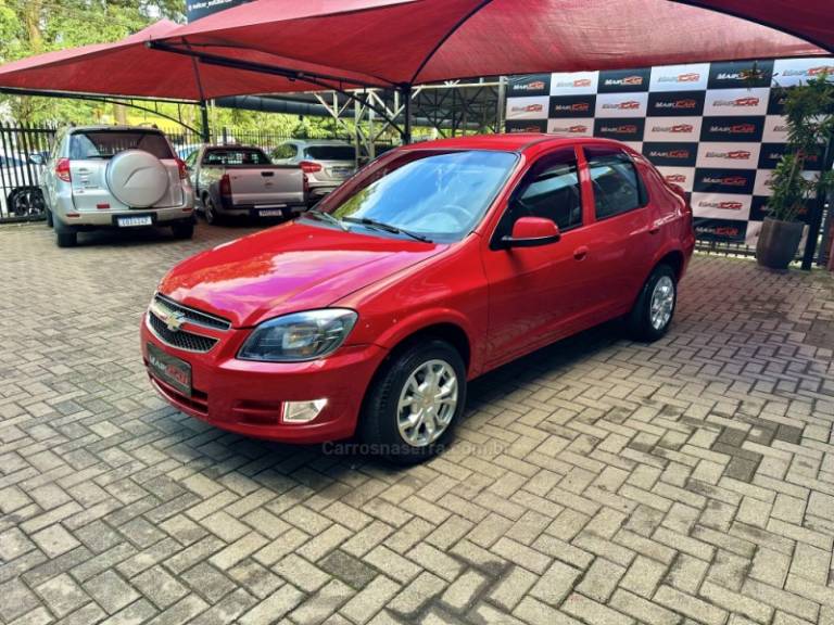CHEVROLET - PRISMA - 2012/2012 - Vermelha - R$ 36.900,00